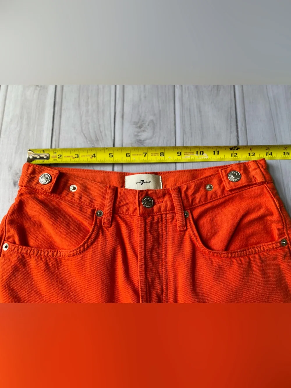 Women’s 7 for all Mankind Easy Ruby Orange raw hem button fly Jean short.Size 26